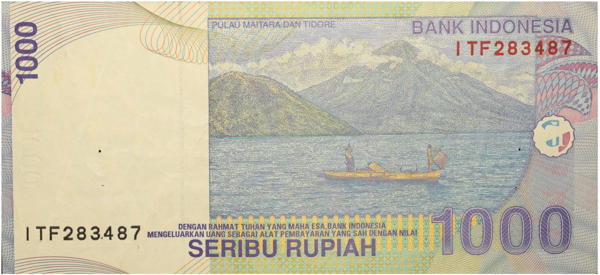 1000 Rupiah of Indonesia Country (AD 2000-2016) with Maitara and Tidore islands in Maluku (Moluccas); with fishermen on a boat