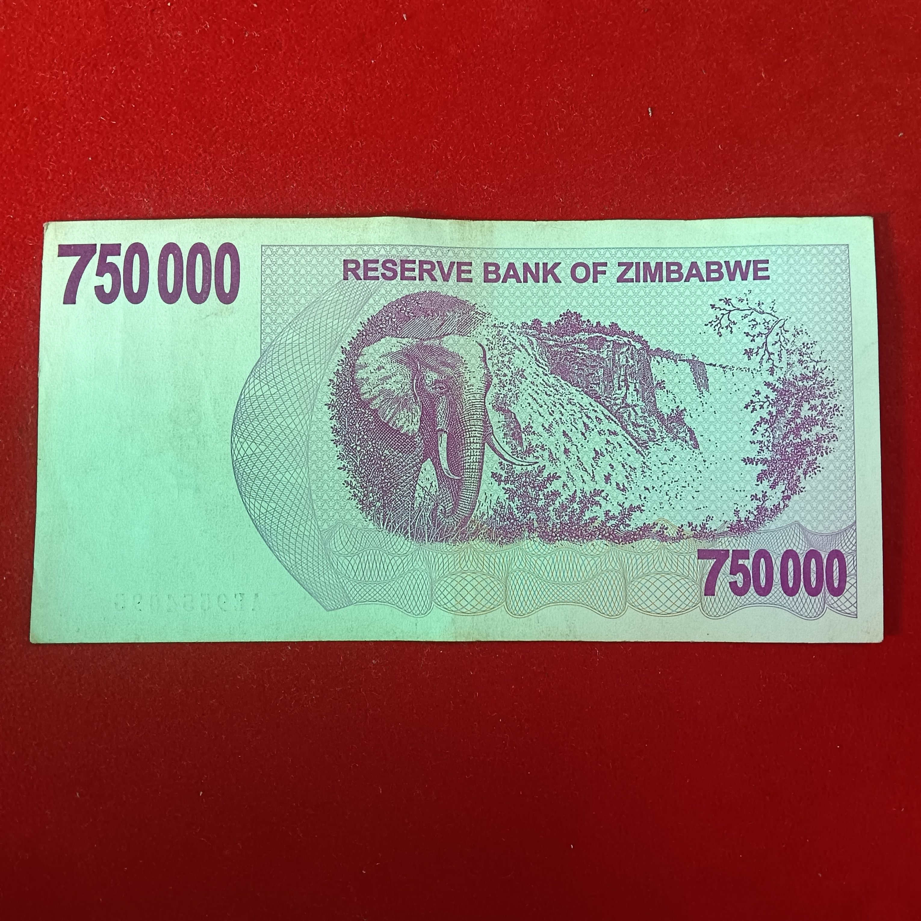 Seventy Five thousand Dollars Issue Date 31 Dec 2007 Good Condition Note Reserve Bank of zimbabwe