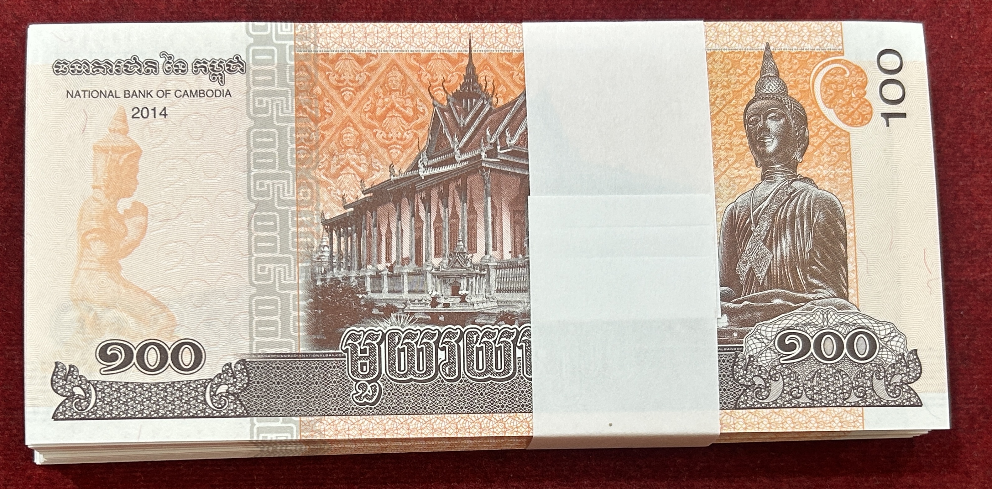 Cambodia 100 Riels - Norodom Sihamoni with Buddha Statue 100 Note serial packet buyer will recieve 1 packet different serial number packet Gem chocolate packet
