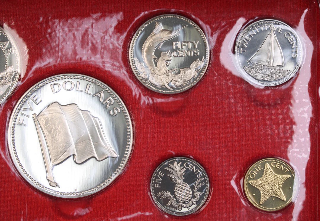 The 1975 Bahamas Proof Set features nine beautifully struck coins, including denominations from 1 cent to 5 dollars. Struck by the Franklin Mint in sterling silver (.925), the silver coins include the 50 cents, $1, $2, and $5 pieces