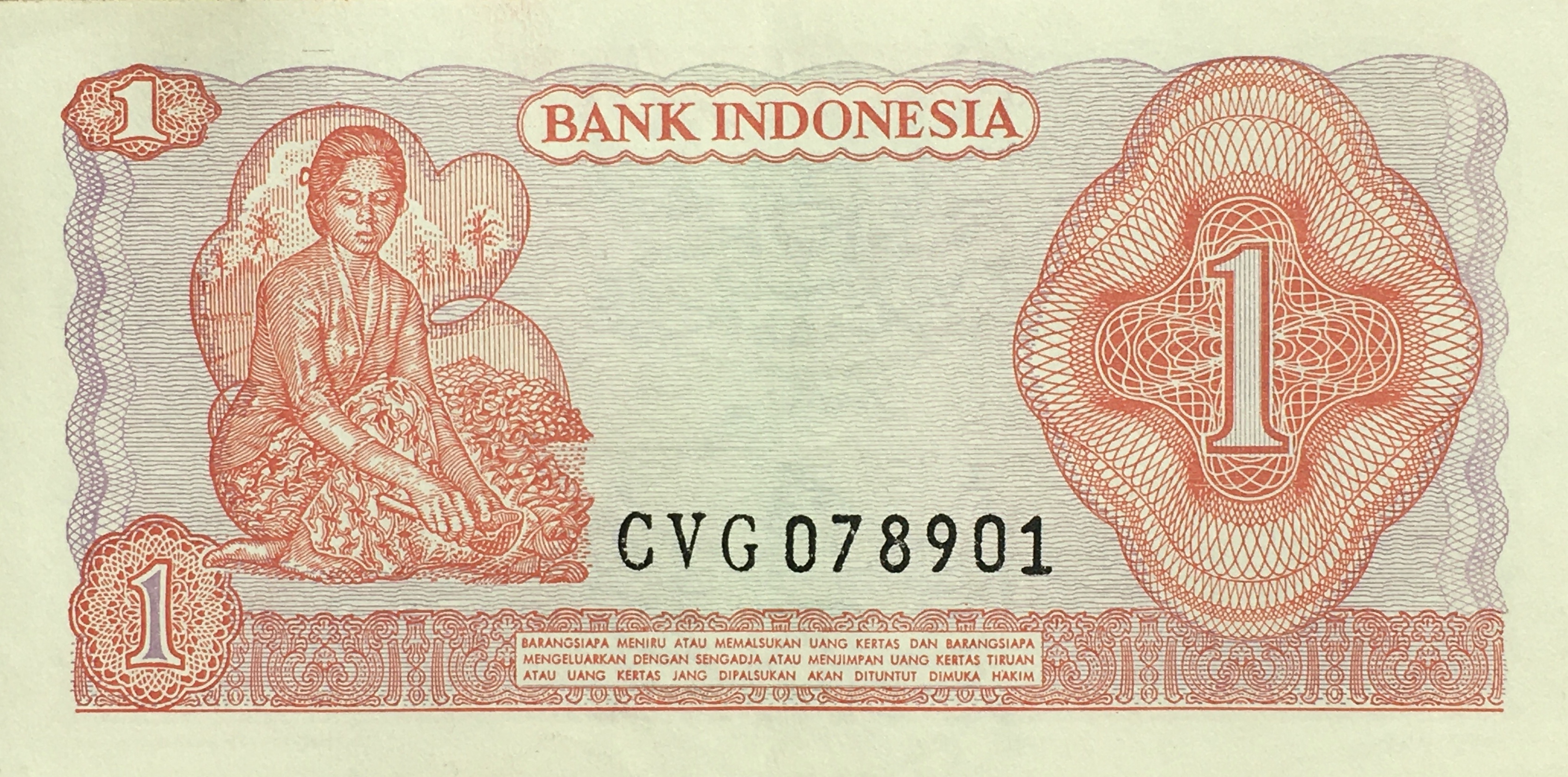 Old 1 Rupiah of Indonesia (AD 1968) with General Sudirman/Woman creating copra