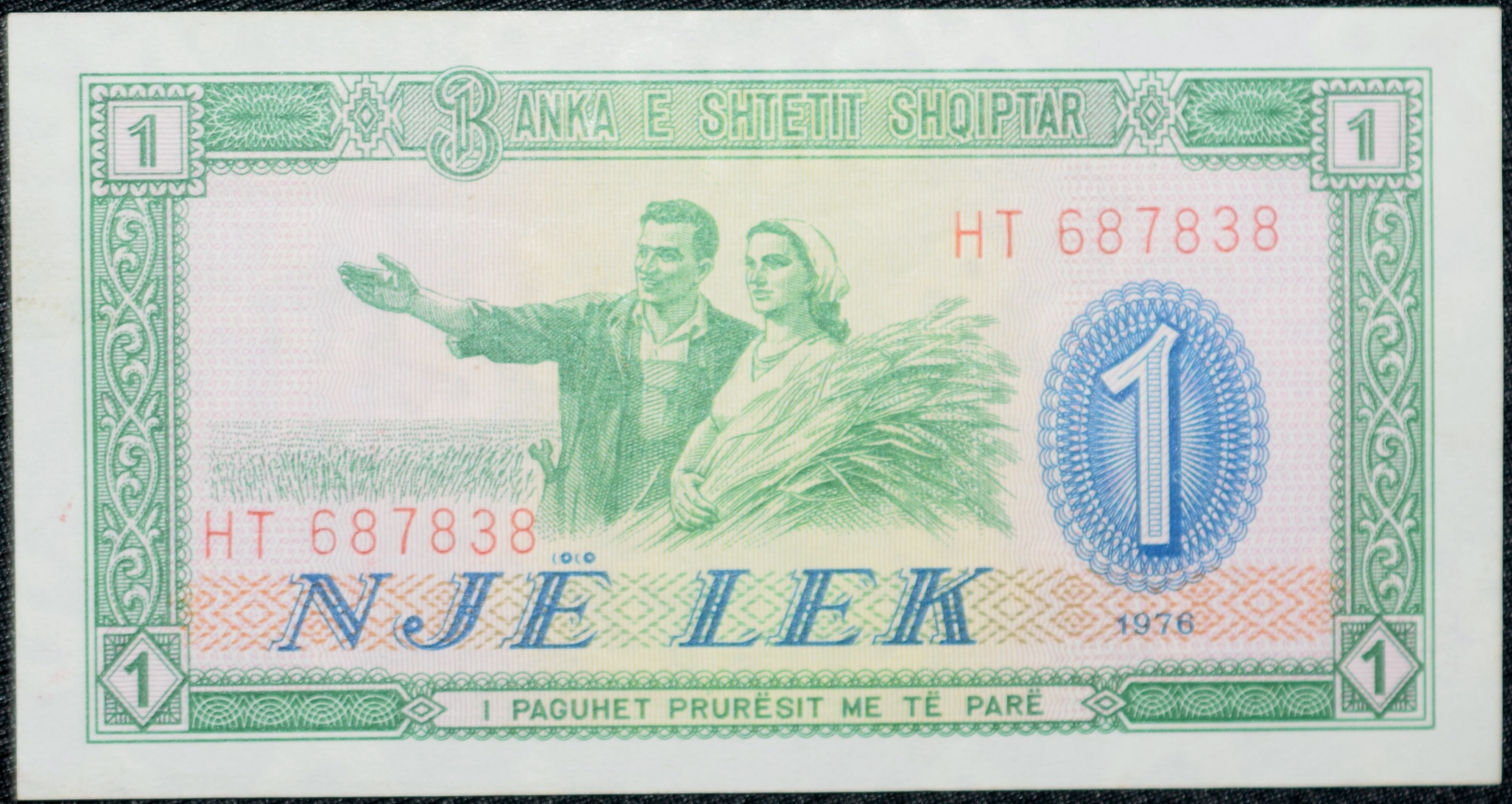 Old 1 Lek of Albania Country (AD 1976) with Albanian peasant woman with a sheaf of wheat