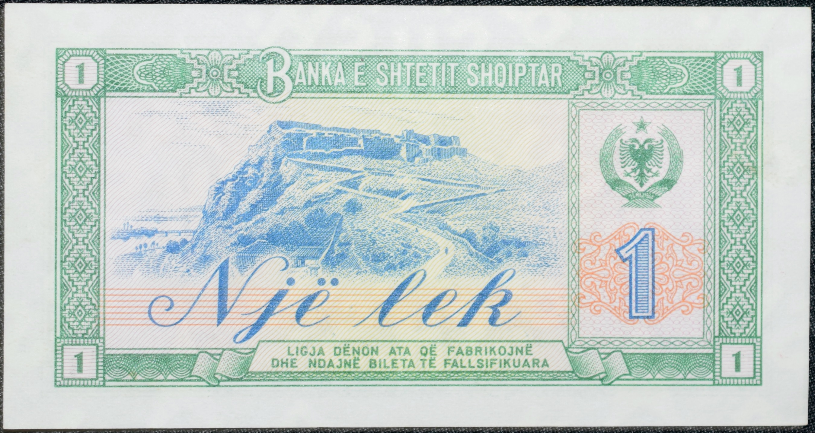 Old 1 Lek of Albania Country (AD 1976) with Albanian peasant woman with a sheaf of wheat