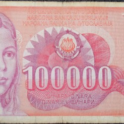100,000 Dinars of Yugoslavia (AD 1989) with Young girl at left/Abstract design with letters and numbers at center right