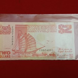 Rare Note Singapore 2 Dollar banknote featuring a traditional tongkang (light wooden boat) from Singapore's Ship Series first issued Gem Unc Condition